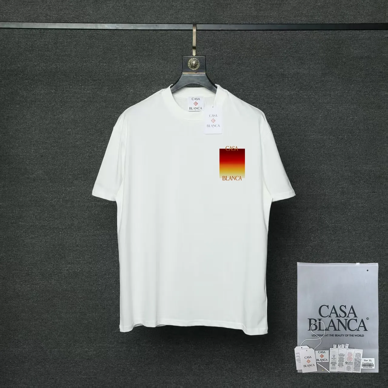 26ss CASABLANCA original printing process short-sleeved T-shirt original development using high-density double yarn pure cotton fabric upper body soft and comfortable color Black White Dark Green color Orange Pink Blue Royal Blue color cigarette powder 8 colors Sizes S M L XL